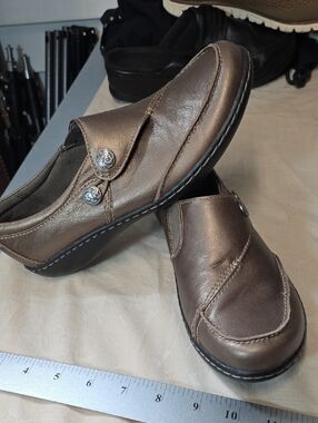 Clarks Metallic Brown Slip-On Loafers for women